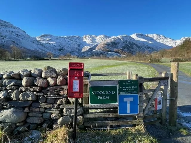 red post box and sign for stool end farm